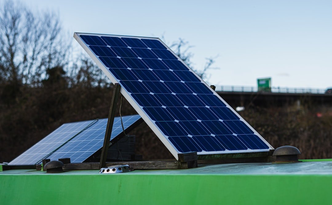 our-mission blue-and-white-solar-panel-on-green-metal-bar-during-daytime-b6vain3wynw